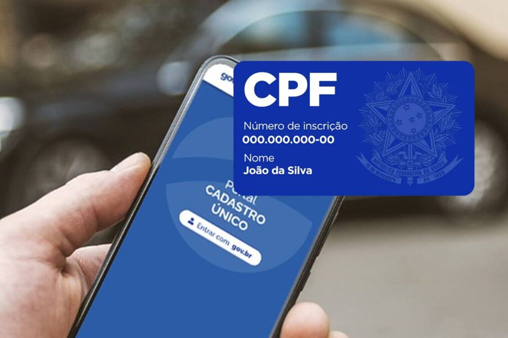 Mão segurando o celular no Cadastro Único e CPF